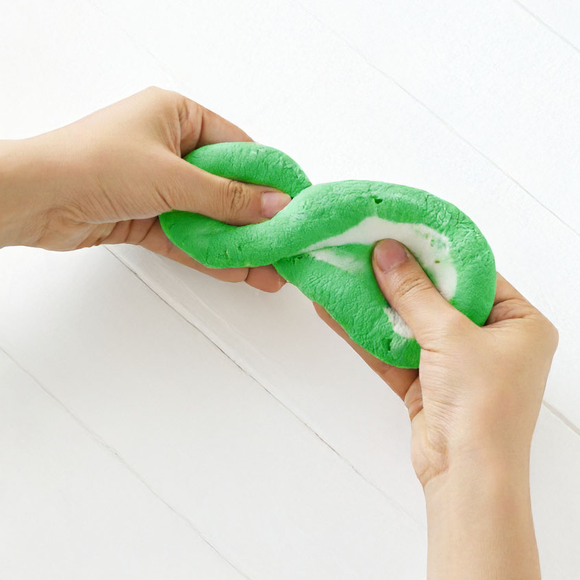 Frog Shaped Container of Passover Green & White Slime - Image 2